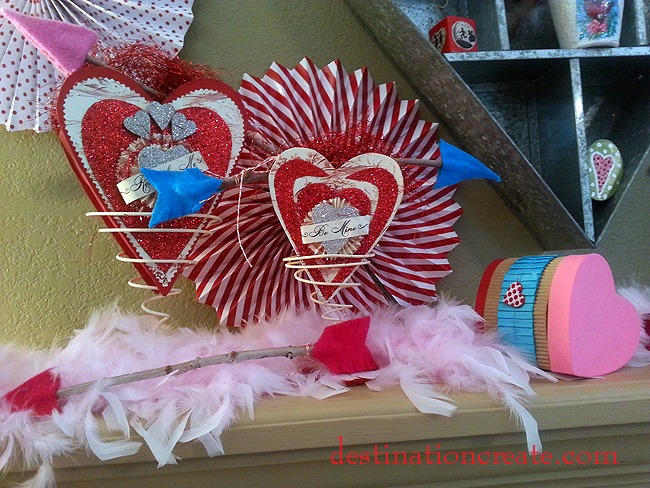Valentine's Day Mantel with playing card garland and red & white paper fans #Valentine#mantel