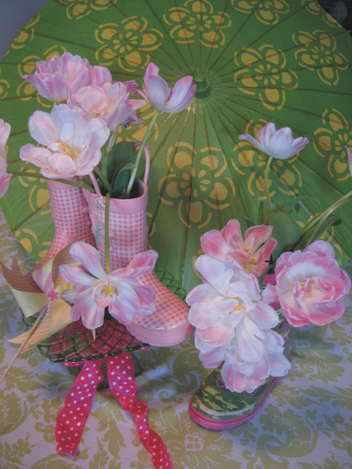 Tulips arranged in galoshes