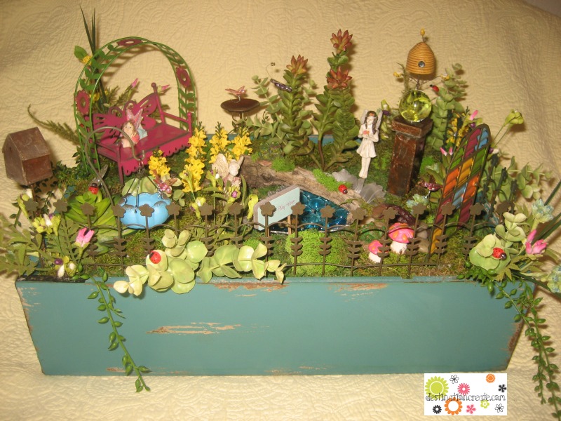 Fairy garden built in turquoise box with Genevieve Gail/Gypsy Garden Collection