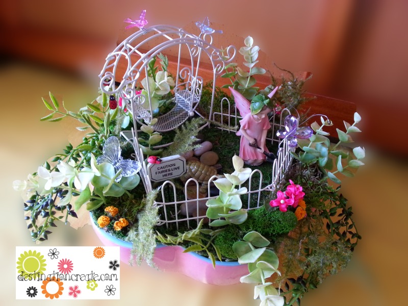 Fairy garden in a pink scalloped bowl