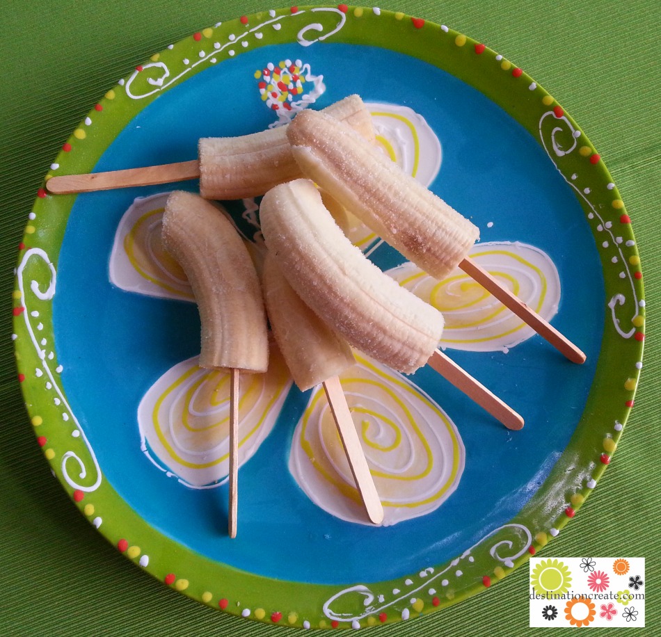 Frozen bananas prepped for dipping
