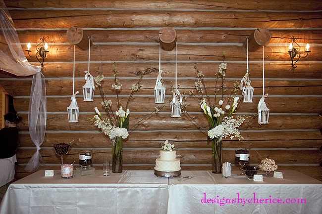 Rustic chic Colorado Mountain wedding tall white centerpieces with white lanterns