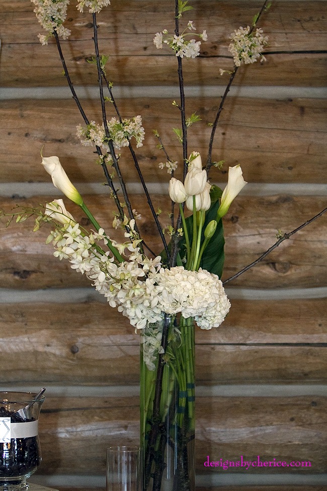 Flowering branches, tulips, large calla lilies, orchids and hydrangeas