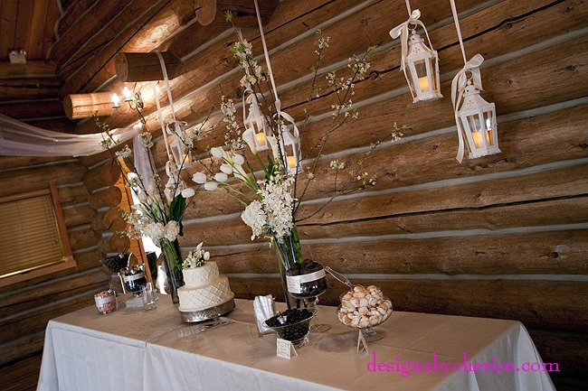 Rustic chic Colorado Mountain wedding tall white centerpieces with white lanterns