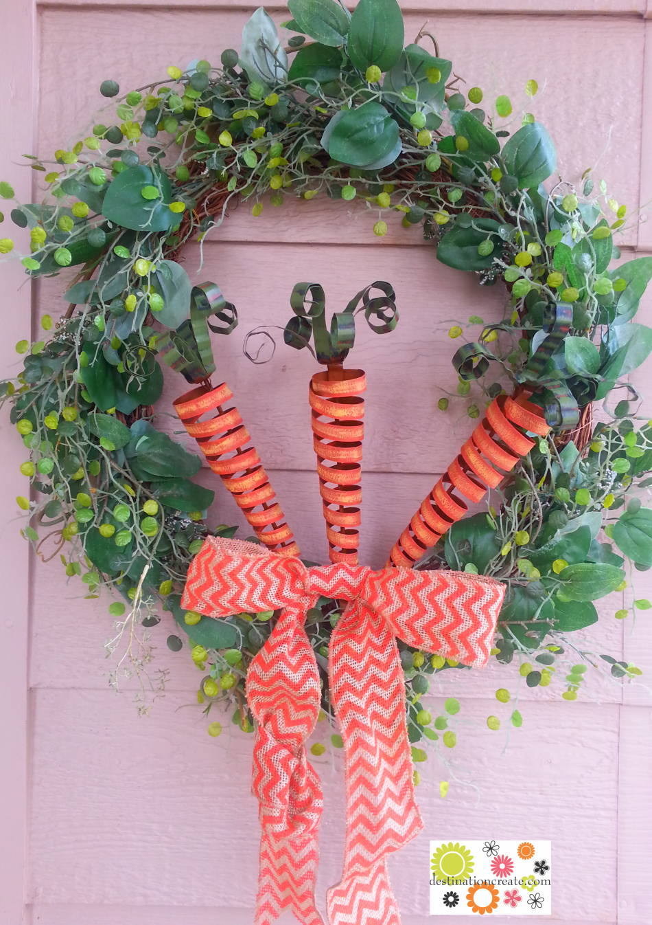 Spring wreath with metal carrot stakes