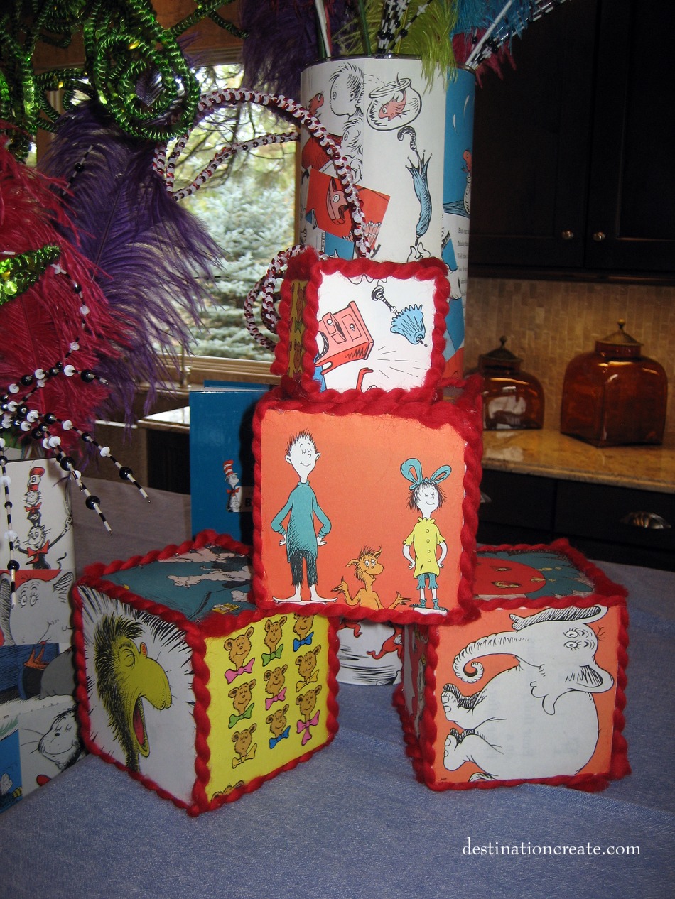 DIY Dr Seuss blocks made from styrofoam blocks and thrift store book pages.