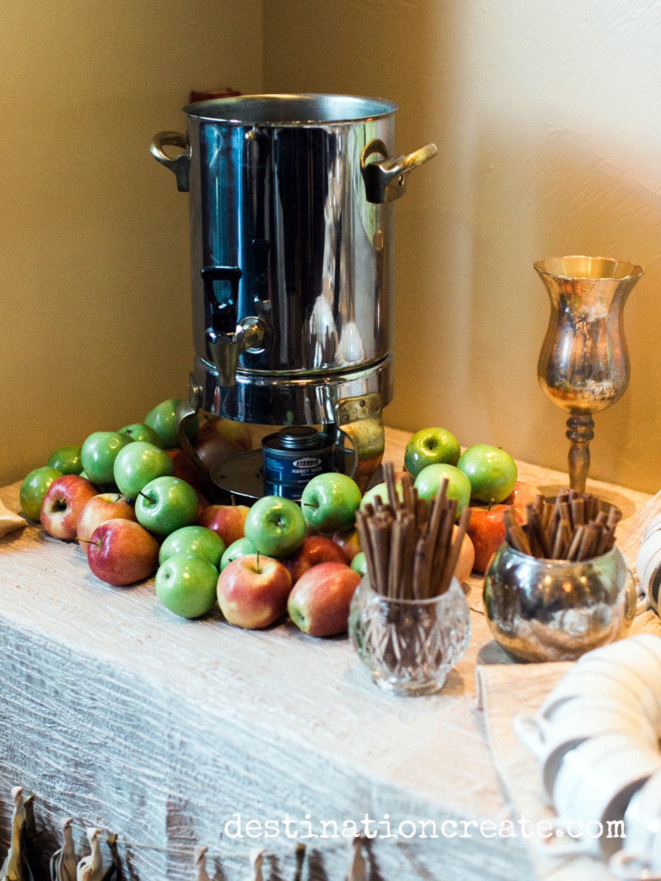 For the non-coffee drinkers on your guest list, hot apple cider is a delicious, warming alternative. Pile apples around the dispenser to entice guests