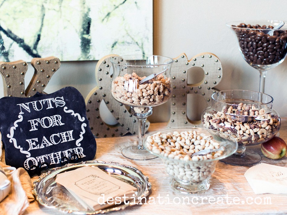 A delicious nut bar greets the wedding guests next to the bar... not a bad idea